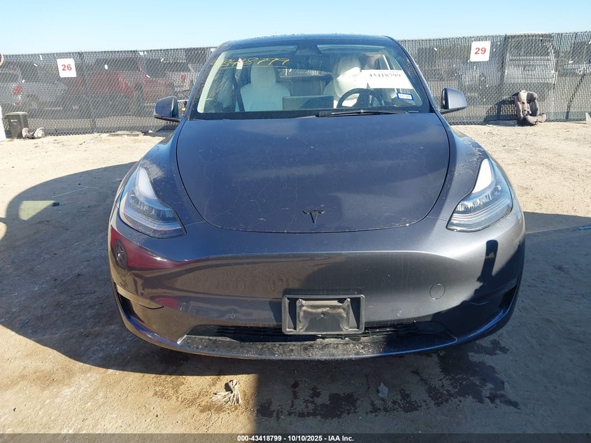 2023 Tesla Model Y Awd/Long Range Dual Motor All-Wheel Drive VIN: 7SAYGAEE5PF584659 Lot: 43418799