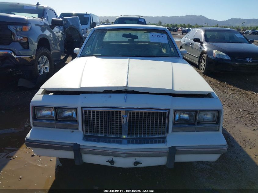 1986 Pontiac Bonneville Le VIN: 2G2GS69H9G2291082 Lot: 43419111
