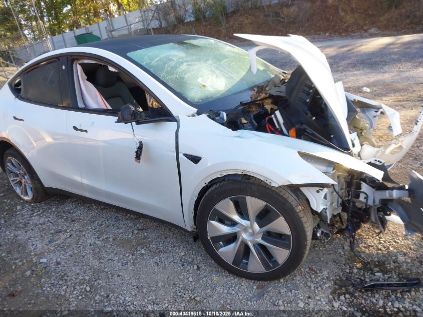 2023 Tesla Model Y Awd/Long Range Dual Motor All-Wheel Drive VIN: 7SAYGDEE3PF766927 Lot: 43419515