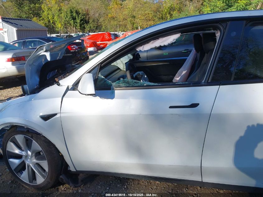 2023 Tesla Model Y Awd/Long Range Dual Motor All-Wheel Drive VIN: 7SAYGDEE3PF766927 Lot: 43419515