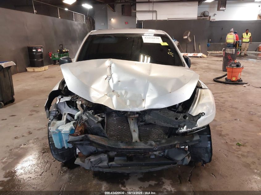 2009 Nissan Versa 1.6 VIN: 3N1CC11EX9L438290 Lot: 43420530