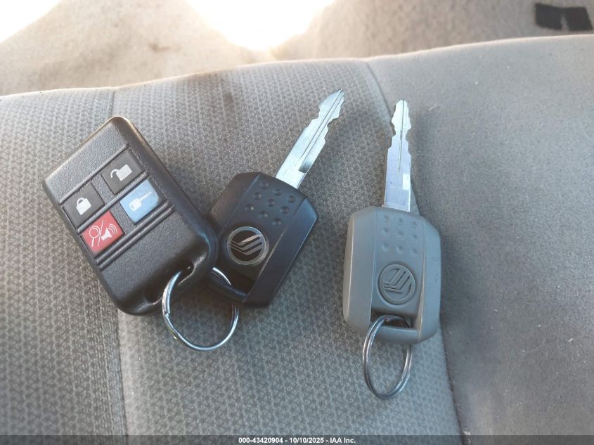 2007 Mercury Grand Marquis Gs VIN: 2MEFM74W87X606744 Lot: 43420904