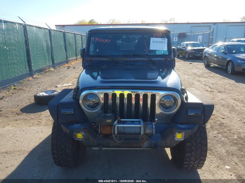 2005 Jeep Tj Unlimited VIN: 1J4FA44S95P329055 Lot: 43421811