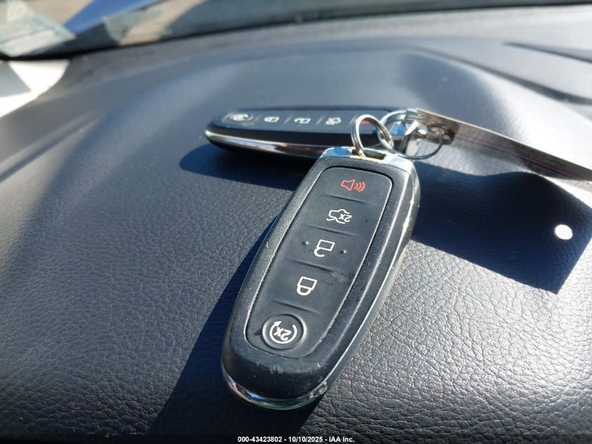 2015 Ford Focus Titanium VIN: 1FADP3N25FL321103 Lot: 43423802