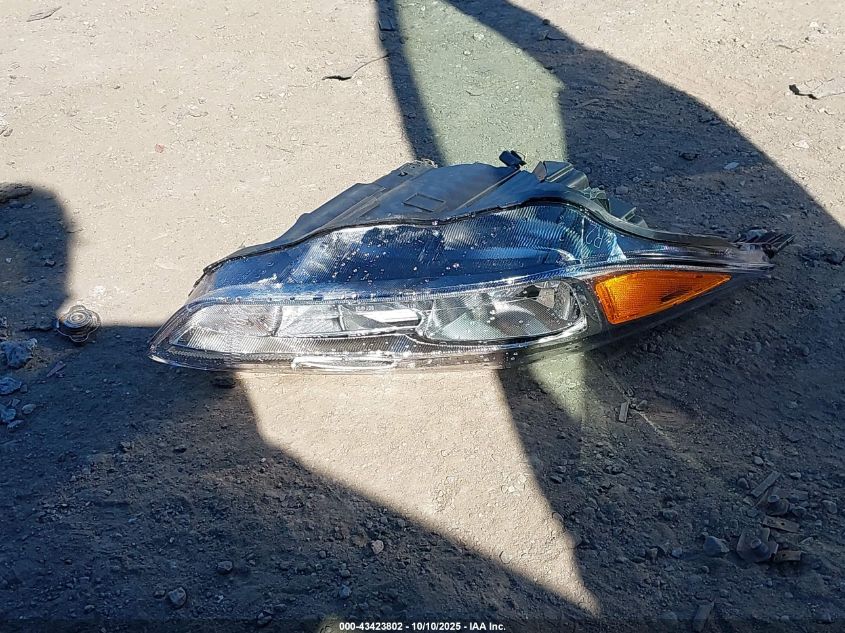 2015 Ford Focus Titanium VIN: 1FADP3N25FL321103 Lot: 43423802