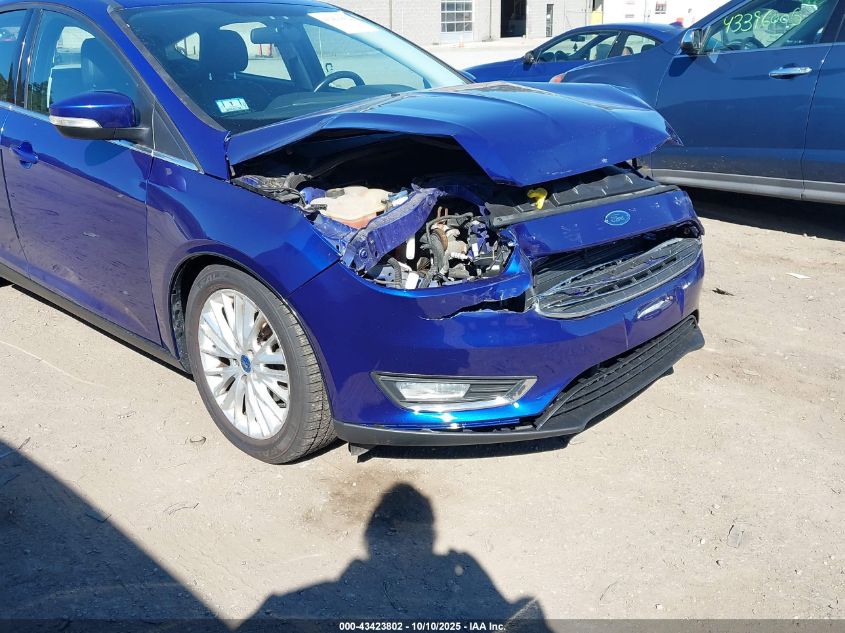 2015 Ford Focus Titanium VIN: 1FADP3N25FL321103 Lot: 43423802