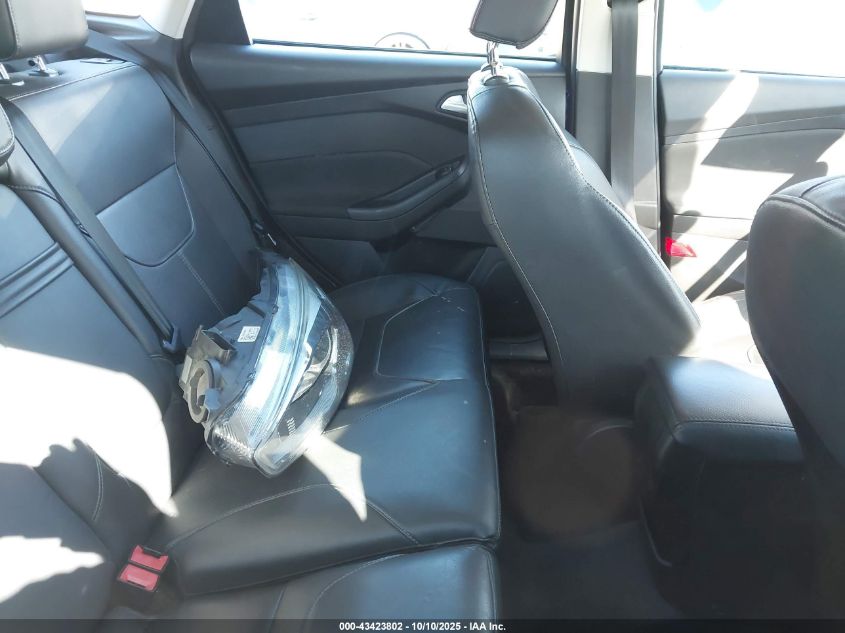 2015 Ford Focus Titanium VIN: 1FADP3N25FL321103 Lot: 43423802