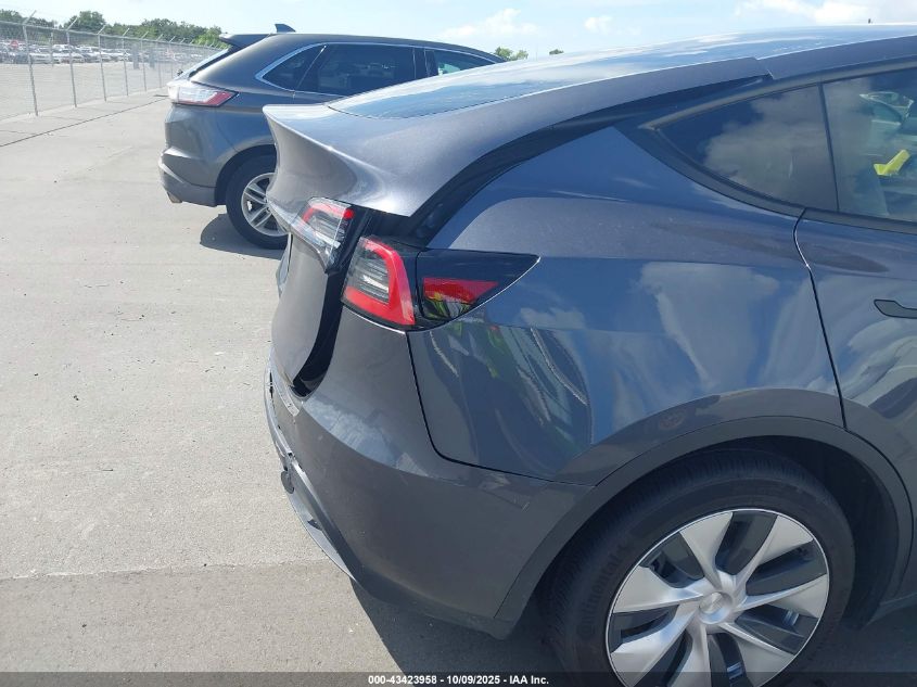 2023 Tesla Model Y Rwd VIN: 7SAYGDED6PF944272 Lot: 43423958