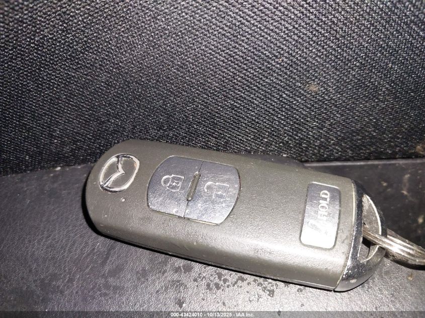 2015 Mazda Cx-5 Touring VIN: JM3KE4CY7F0491024 Lot: 43424010