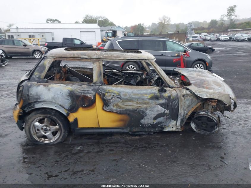 2007 Mini Cooper VIN: WMWMF335X7TU62659 Lot: 43424534