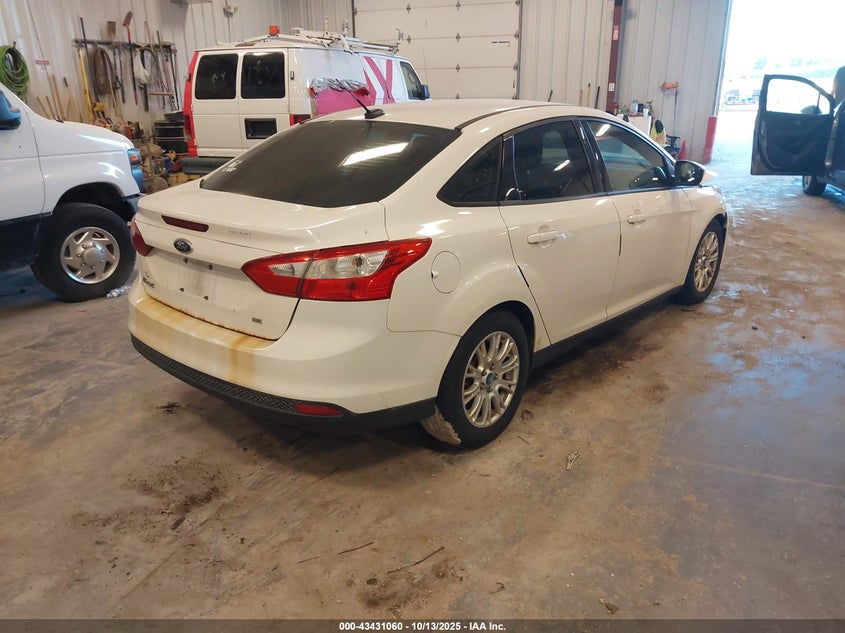1FAHP3F21CL332952 2012 FORD FOCUS photo no. 4