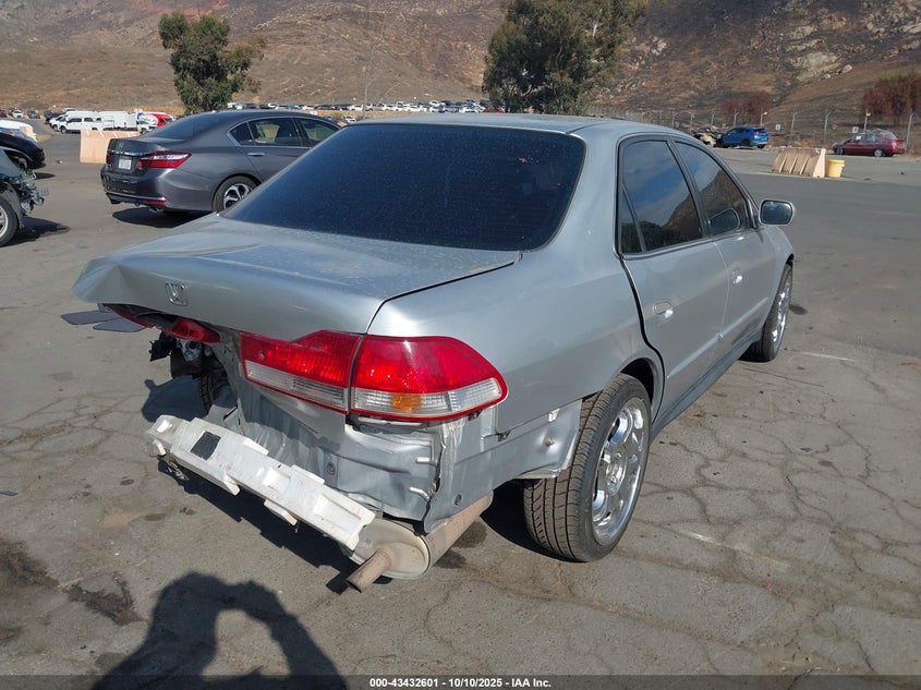 1HGCG66862A106900 2002 HONDA ACCORD photo no. 4
