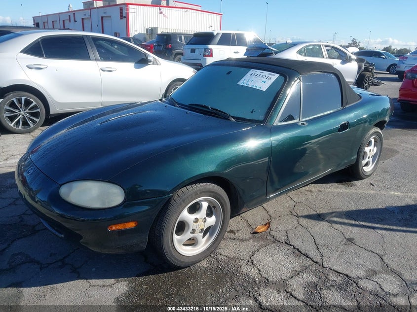 JM1NB3538X0103052 1999 MAZDA MX-5 photo no. 2