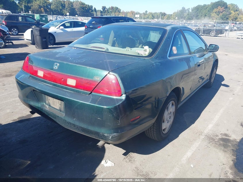 1HGCG2240XA005516 1999 HONDA ACCORD photo no. 4