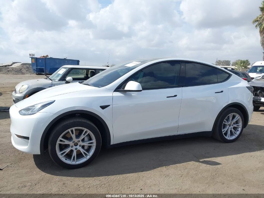 2023 Tesla Model Y Awd/Long Range Dual Motor All-Wheel Drive VIN: 7SAYGDEE5PA035557 Lot: 43447239