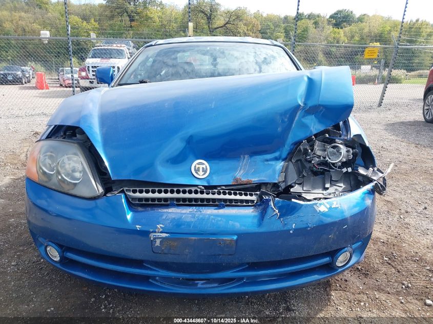 2004 Hyundai Tiburon Gt V6/Gt V6 Special Edition VIN: KMHHN65F44U153298 Lot: 43448607