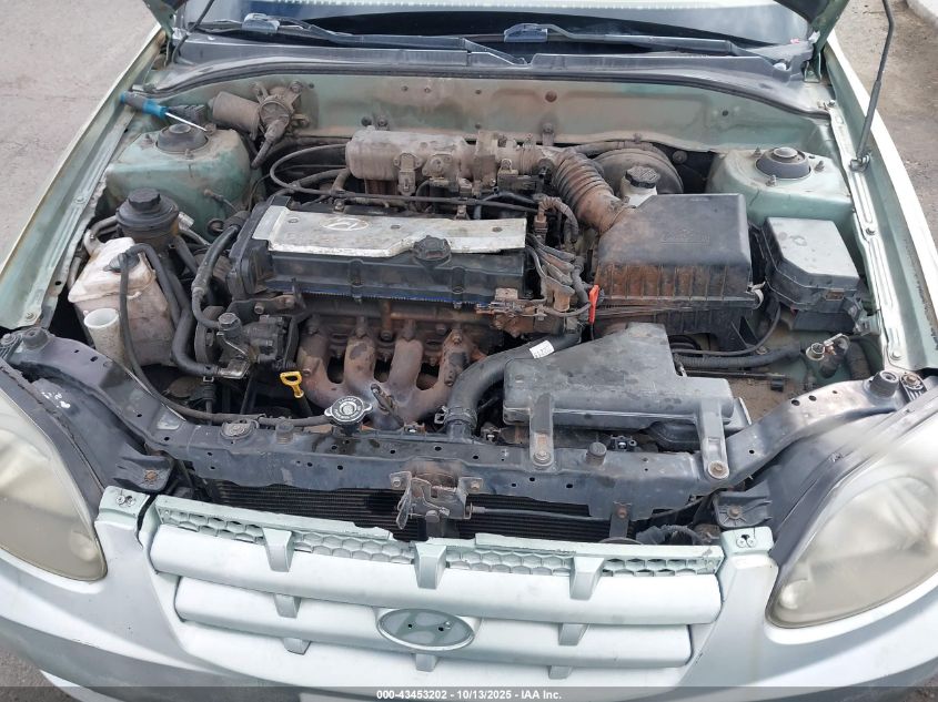 2004 Hyundai Accent Gl VIN: KMHCG45CX4U551209 Lot: 43453202