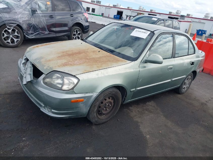 2004 Hyundai Accent Gl VIN: KMHCG45CX4U551209 Lot: 43453202