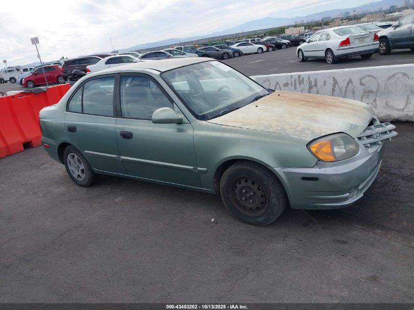 2004 Hyundai Accent Gl VIN: KMHCG45CX4U551209 Lot: 43453202