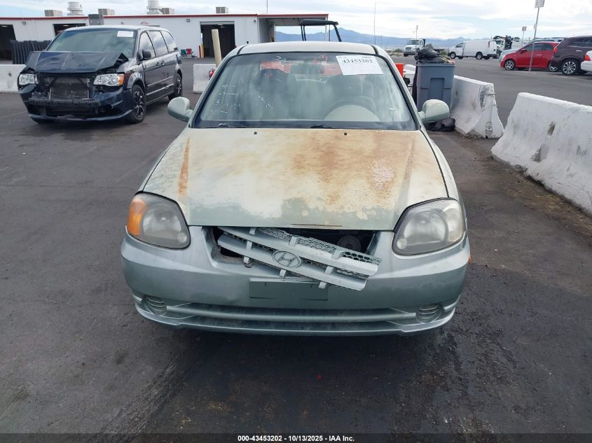 2004 Hyundai Accent Gl VIN: KMHCG45CX4U551209 Lot: 43453202