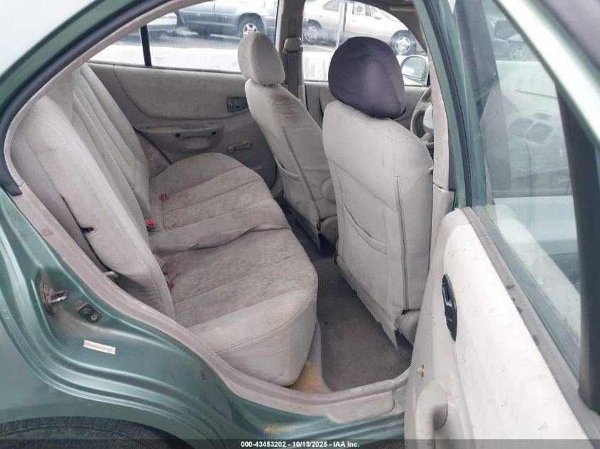 2004 Hyundai Accent Gl VIN: KMHCG45CX4U551209 Lot: 43453202