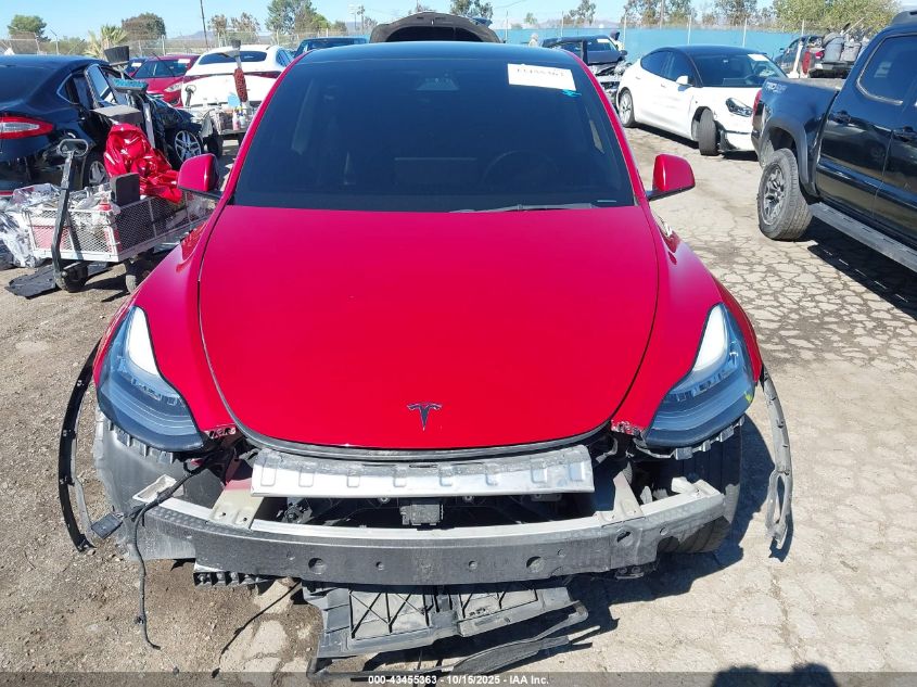 2021 Tesla Model Y Standard Range Rear-Wheel Drive VIN: 5YJYGDED7MF121889 Lot: 43455363