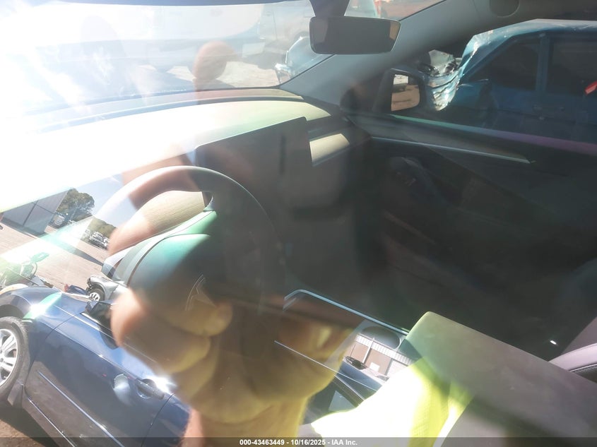 2024 Tesla Model Y Long Range Dual Motor All-Wheel Drive VIN: 7SAYGDEE0RA215113 Lot: 43463449