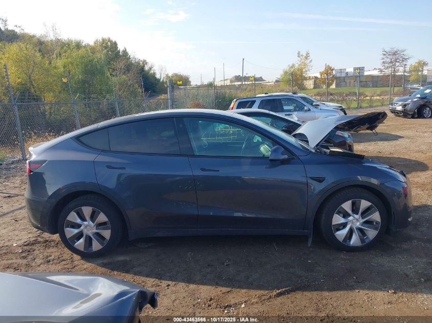 2023 Tesla Model Y Awd/Long Range Dual Motor All-Wheel Drive VIN: 7SAYGAEE1PF584206 Lot: 43463566