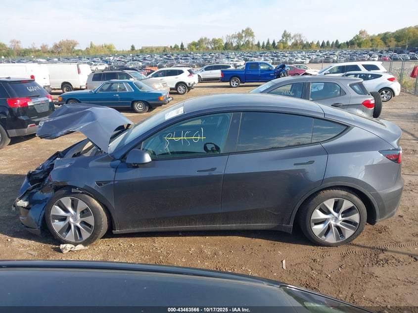 2023 Tesla Model Y Awd/Long Range Dual Motor All-Wheel Drive VIN: 7SAYGAEE1PF584206 Lot: 43463566