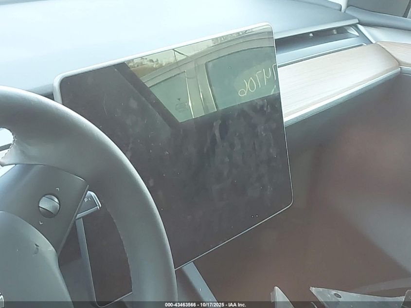 2023 Tesla Model Y Awd/Long Range Dual Motor All-Wheel Drive VIN: 7SAYGAEE1PF584206 Lot: 43463566