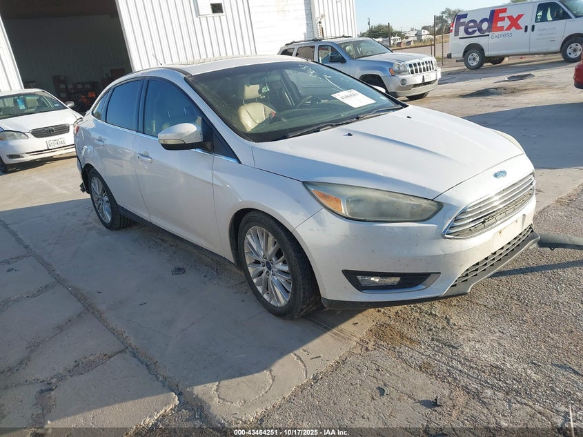 2016 FORD FOCUS TITANIUM - 1FADP3J29GL319037