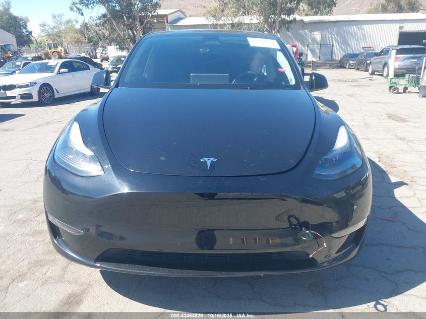 2025 Tesla Model Y Long Range Dual Motor Rear-Wheel Drive VIN: 7SAYGDED5SF248415 Lot: 43464829