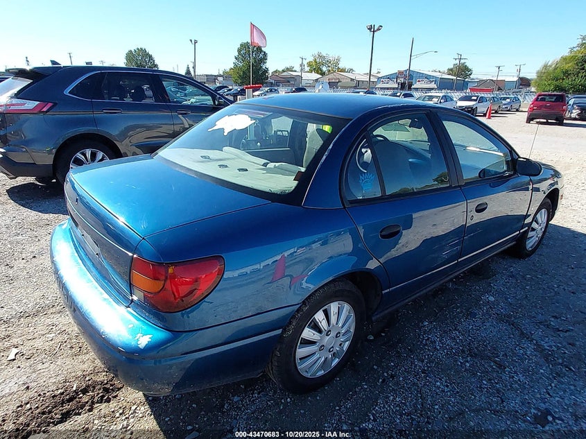 1G8ZG5283YZ115518 2000 SATURN SL photo no. 4