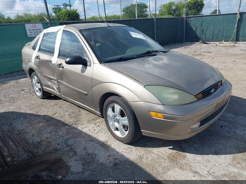 2004 Ford Focus Zts brown sedan gasoline 1FAFP38Z84W183828 photo #1
