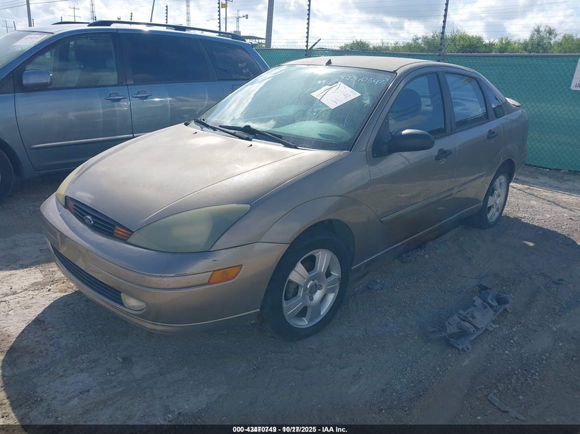 2004 Ford Focus Zts brown sedan gasoline 1FAFP38Z84W183828 photo #3