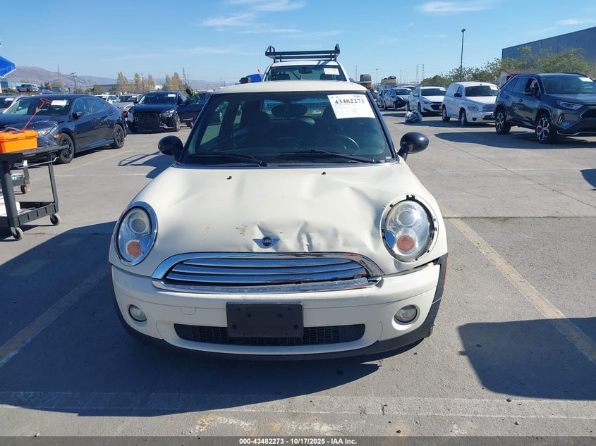 2009 Mini Cooper VIN: WMWMF33559TW77899 Lot: 43482273