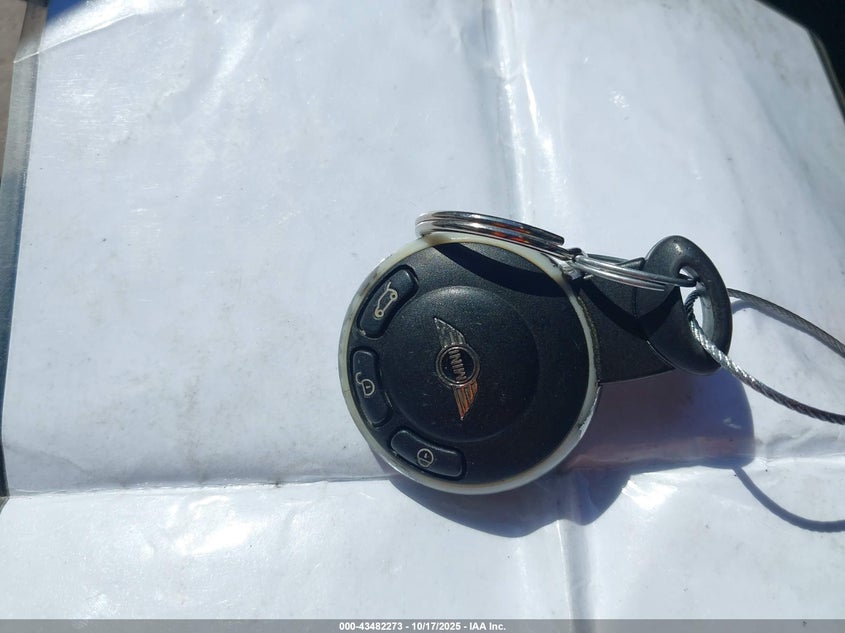 2009 Mini Cooper VIN: WMWMF33559TW77899 Lot: 43482273