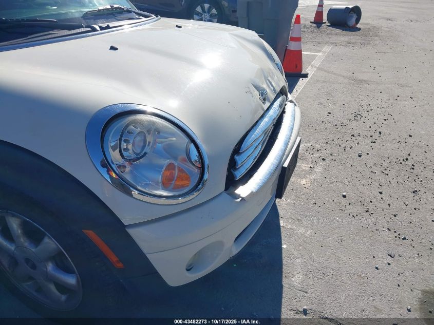 2009 Mini Cooper VIN: WMWMF33559TW77899 Lot: 43482273