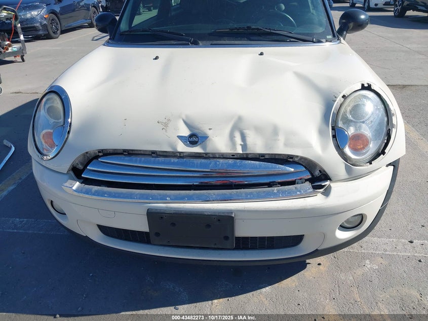 2009 Mini Cooper VIN: WMWMF33559TW77899 Lot: 43482273