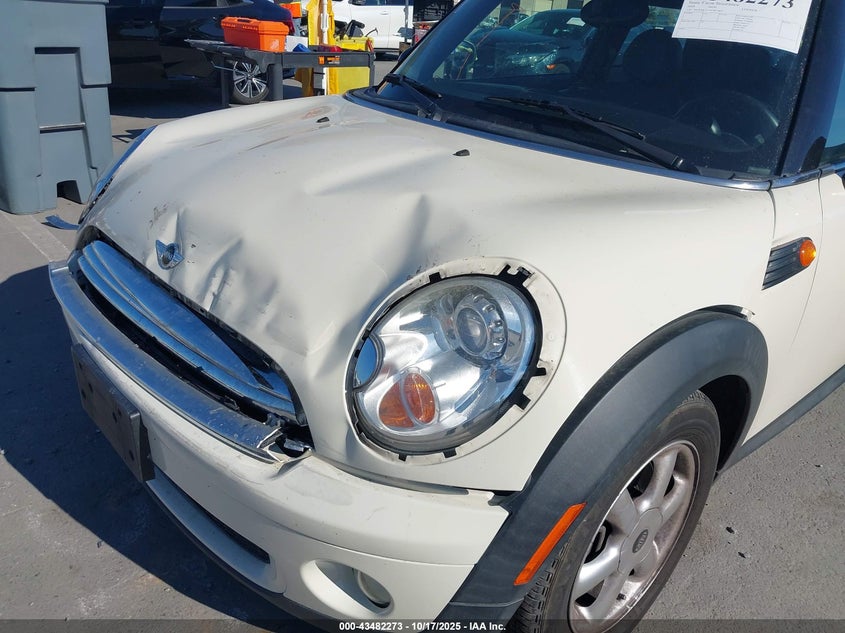 2009 Mini Cooper VIN: WMWMF33559TW77899 Lot: 43482273