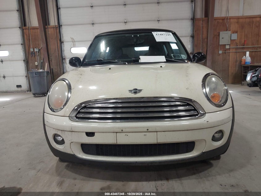 2009 Mini Cooper VIN: WMWMF33569TW71335 Lot: 43487245
