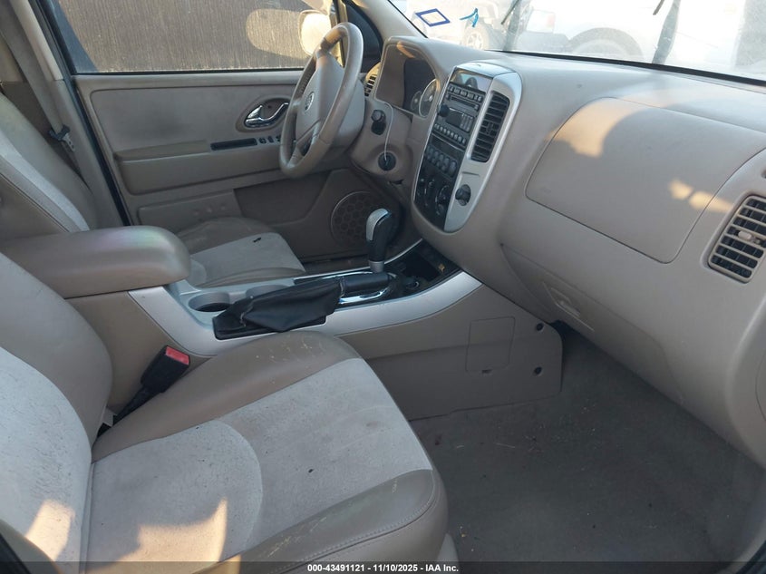 4M2CU97107KJ19941 2007 MERCURY MARINER photo no. 5