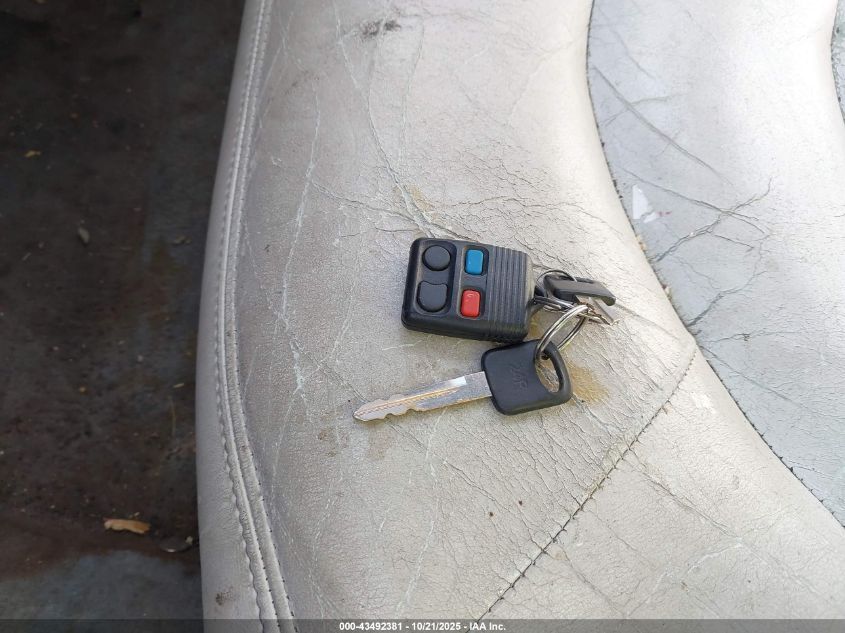 1997 Lincoln Town Car Signature VIN: 1LNLM82W7VY743311 Lot: 43492381