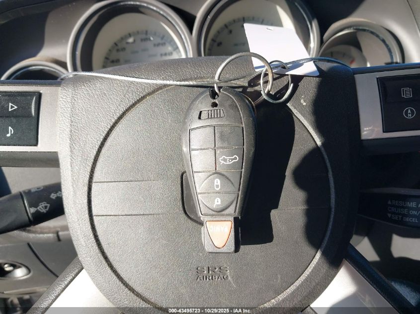 2009 Dodge Challenger Srt8 VIN: 2B3LJ74W39H581814 Lot: 43495723