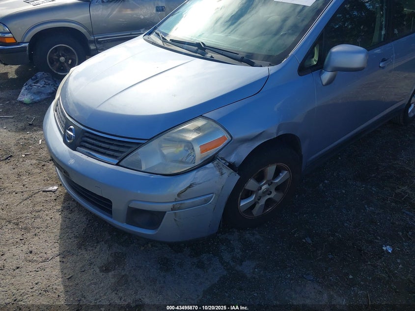 2009 Nissan Versa 1.8Sl VIN: 3N1BC13E49L407612 Lot: 43495870