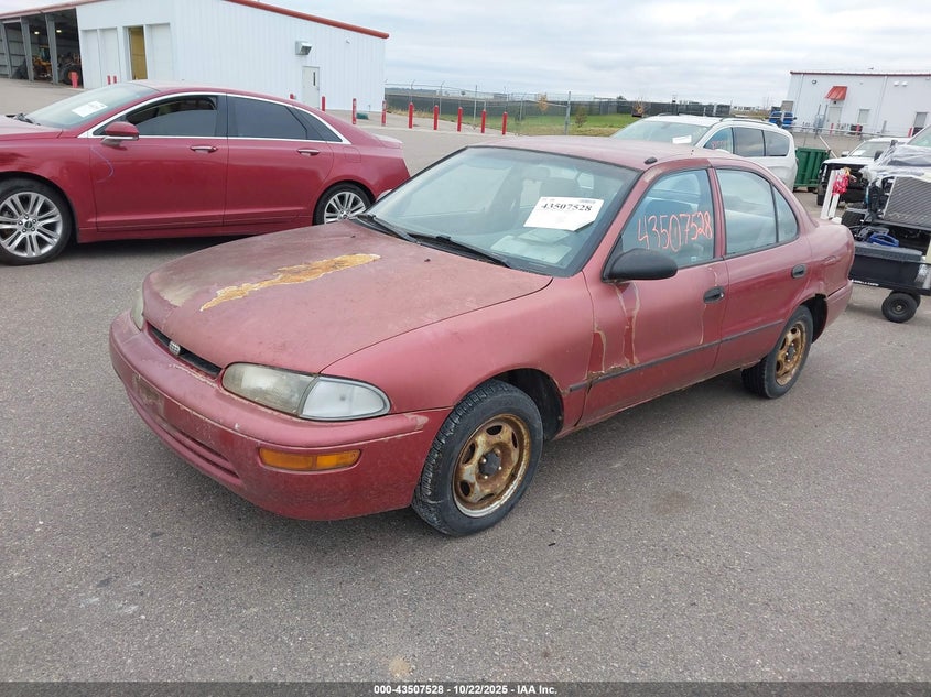 1Y1SK5265SZ031319 1995 GEO PRIZM photo no. 2