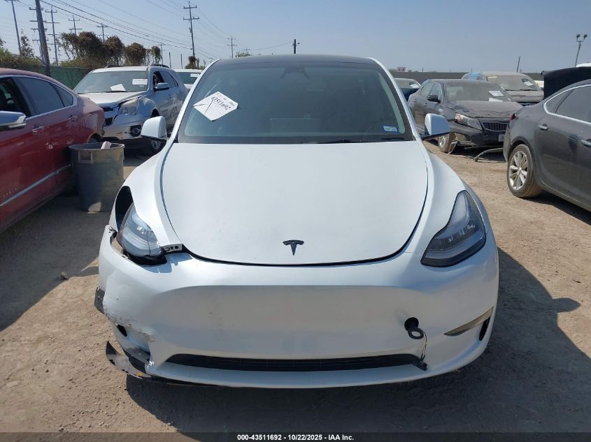 2023 Tesla Model Y Awd/Long Range Dual Motor All-Wheel Drive VIN: 7SAYGDEE9PA060512 Lot: 43511692