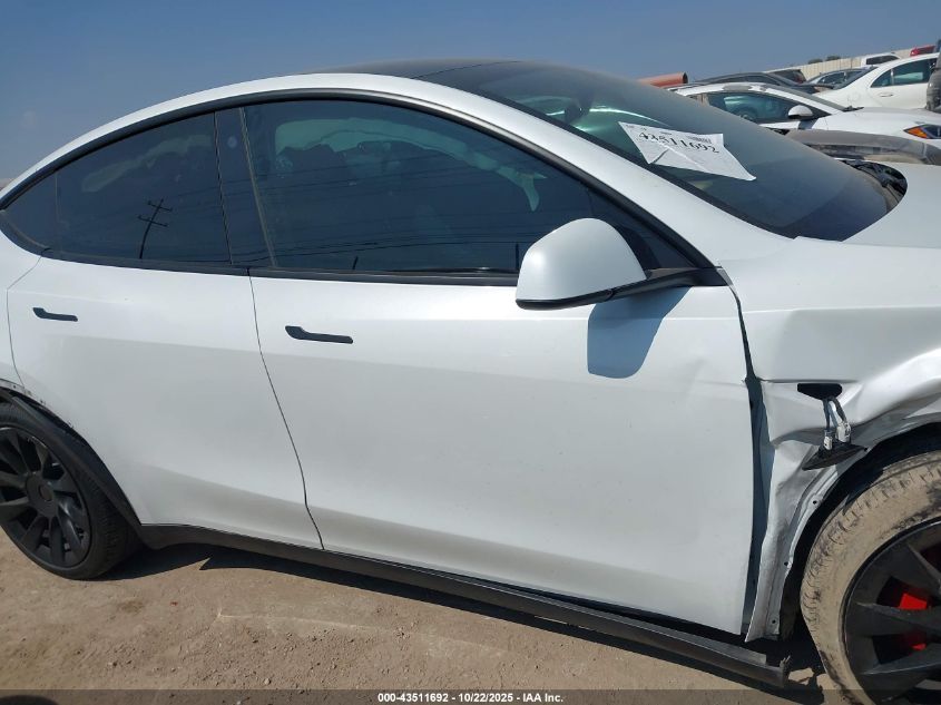 2023 Tesla Model Y Awd/Long Range Dual Motor All-Wheel Drive VIN: 7SAYGDEE9PA060512 Lot: 43511692