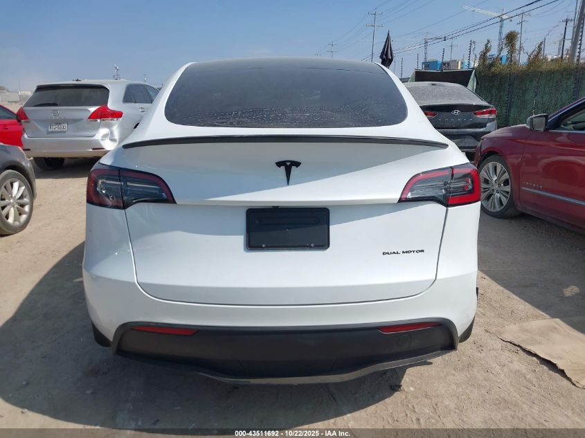 2023 Tesla Model Y Awd/Long Range Dual Motor All-Wheel Drive VIN: 7SAYGDEE9PA060512 Lot: 43511692