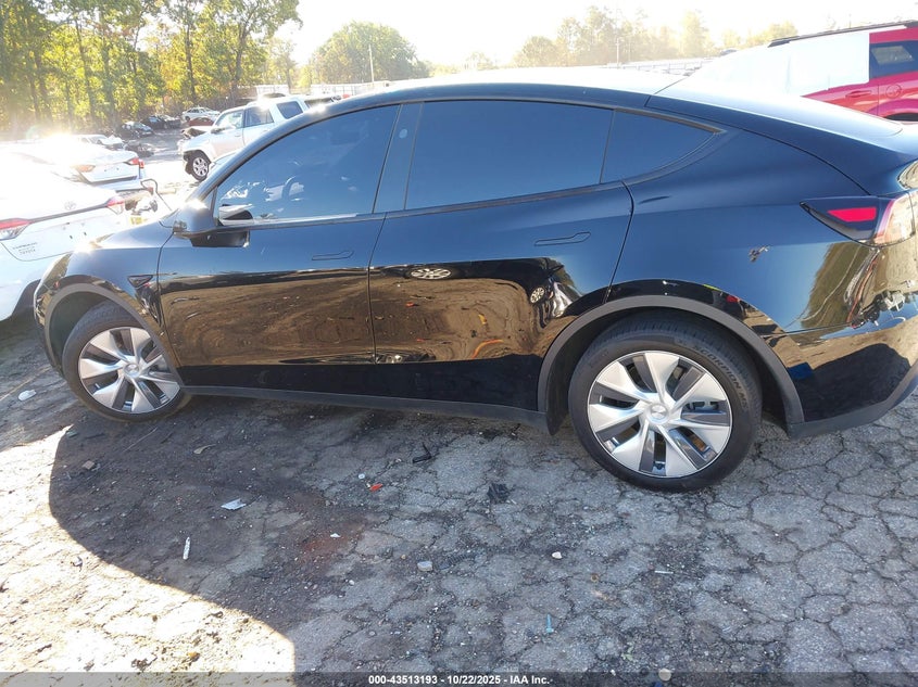 2023 Tesla Model Y Awd/Long Range Dual Motor All-Wheel Drive VIN: 7SAYGDEE1PA187657 Lot: 43513193